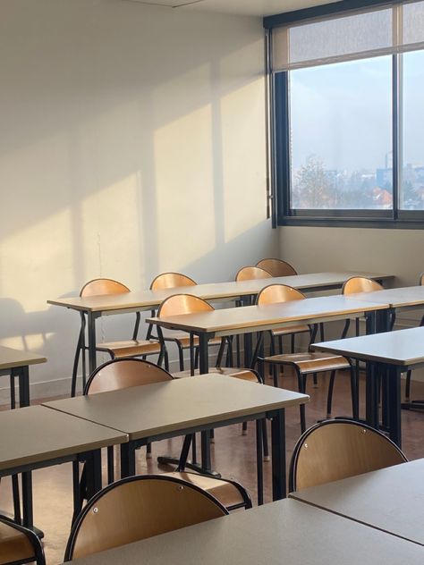 An empty classroom. American Classroom Aesthetic, Classroom Setting Background, French Classroom Aesthetic, Empty Classroom Aesthetic, Classroom Background Real, Classroom Background Aesthetic, University Classroom Aesthetic, School Background Classroom, College Classroom Aesthetic