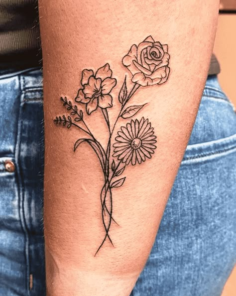 Daisy Tattoo Design Images (Daisy Ink Design Ideas) Sunflower And Gerber Daisy Tattoo, Daisy And A Rose Tattoo, Poppy Daisy Rose Tattoo, Daisy Rose And Poppy Tattoo, Lily Rose And Daisy Tattoo, Violets And Daisy Tattoo, Violet Daisy Rose Tattoo, Daisy Marigold Tattoo, Oopsie Daisy Tattoo