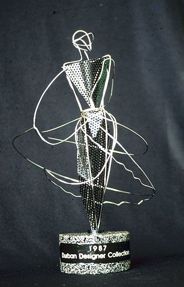 Fashion design award trophy 1987 Fashion Awards Trophy, Award Trophy, Fashion Dream Job, Awards Trophy, Fashion Awards, Canadian Art, Dream Job, Design Awards, Macrame Plant Hanger