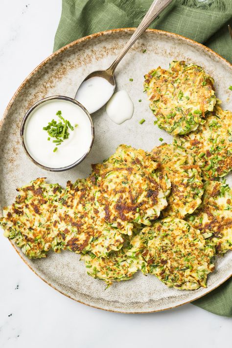 Like potato pancakes but with fewer carbs, these savory Zucchini Pancakes are the perfect side dish with grilled chicken or meat. #zucchini #vegetarian #summer #sidedish #healthyrecipes Zucchini Pancake, Veggie Kabobs, Affordable Recipes, Zucchini Pancakes, Cauliflower Fritters, Grilled Corn Salad, Healthy Budget, Watermelon Feta Salad, Watermelon And Feta