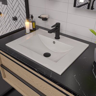 This sink gets the job done in the most classic way with the worlds most commonly used type of bathroom sink. A ceramic rectangular drop in sink that is timeless and will never go out of style. Also available in a square shape (ABC801) or a round shape (ABC802). Drop-in installation works great with any countertop type. | Alfi Brand Rectangular Drop-in Bathroom Sink w/ Overflow in White, Size 6.75 H x 23.63 W x 18.13 D in | Wayfair Porcelain Bathroom Sink, Types Of Countertops, Drop In Bathroom Sinks, Rectangular Sink Bathroom, Copper And Grey, Sink Sizes, Drop In Sink, Undermount Bathroom Sink, Basin Design