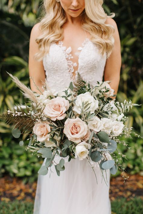 Classic Florida Bride, Ashley Stegbauer Morrison Wearing Boho Chic Inspired Ines Di Santo Wedding Dress, White Lace Fit and Flare with Plunging Neckline, Holding Lush Ivory Flowers and Blush Pink Roses, Pampas Grass, Bouquets with Greenery Eucalyptus | Downtown St. Pete Wedding Planner Parties A’ La Carte | Luxury Florida Wedding and Bridal Dress Shop Isabel O’Neil Bridal Collection Blush Bridal Bouquet, Bohemian Wedding Decorations, Bridal Bouquet Flowers, Grass Wedding, Blush Bridal, Bride Flowers, Wedding Flower Inspiration, Wedding Decor Inspiration, Wedding Flower Arrangements