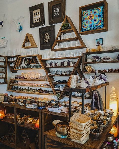 Love the stones, the intricate wooden stone displays, & the wall art Lingerie Store Design, Wood Shelves Kitchen, Witch Store, Sacred Space Altar, Witchy Room, Crystal Witch, Wiccan Decor, Crystal Shelves, Witch Shop