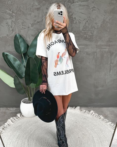 #taptoshop #summerfashion #boutique Graphic Tee As A Dress, Dallas Bar Outfits, Oversized Tee Cowboy Boots, Dress Up An Oversized Tshirt, Hipster Going Out Outfit, Jessi Murph Concert Outfits, Oversized Tee And Tights, February Nashville Outfits, Rock N Roll Dress Up