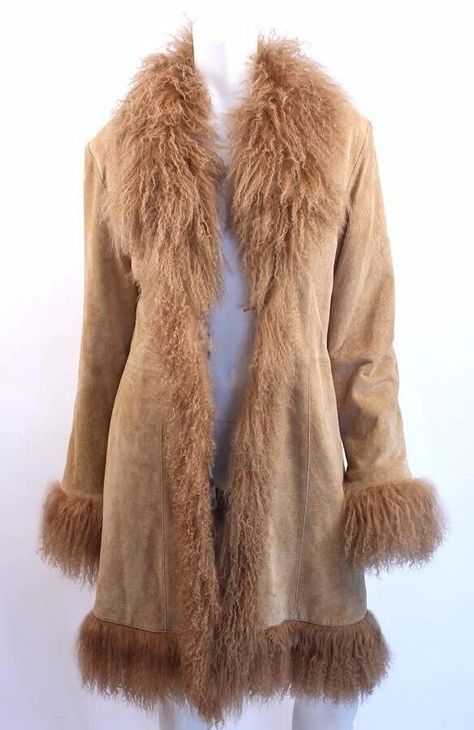 Elevate your winter style with our exquisite Penny Lane Coat for women, a luxurious blend of vintage charm and contemporary elegance. Crafted from sumptuous shearling and adorned with Mongolian fur accents, this Afghan coat exudes retro sophistication reminiscent of the 70s era. Its long silhouette and boho-inspired design make it a standout piece, perfect for adding a touch of hippie flair to your wardrobe. Made from premium suede and featuring a timeless brown hue, this Y2K coat promises both Mongolian Lamb Fur Coat, Long Shearling Coat, Women Fur Coat, Fur Coat Long, Afghan Coat, Mongolian Fur, Penny Lane Coat, Fur Coats Women, Suede Coat