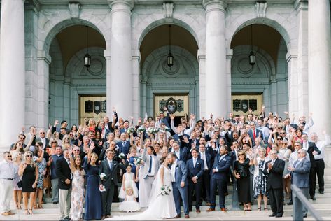 Getting a group photo when you have almost 200 people at your wedding is not an easy task, but the stairs at the Basilica makes it a perfect spot to get it. Have your guests gather on them with the wedding party lining the stairs. Make your exit from the church, pause for a couple of amzing photos, and then hop on your shuttle with your people to start the party! Check out Sarah and Grant's blog and read all about their big day! Wedding Photo With All Guests, Guest Wedding Photos, Big Group Wedding Photos, Wedding Guest Group Photo, Wedding Photo Ideas For Photographers Group Shots, Large Family Wedding Photos, Wedding Guests Photography, Wedding Photos With Guests, Group Photo Wedding