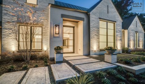 Your walkway has the important job of leading your guests to your front porch and door. It takes up space in the front of your house and is the first thing people see. Overall, your walkway makes a bold statement about the architecture of your home and your personal style. Finding the correct style and the use of landscape is a great way to jazz up your space! Many people forget their walkway and just throw down builder concrete, when it’s easy to create a walkway people remember.  See how! Farmhouse Exterior Design, Modern Farmhouse Home, Contemporary Exterior, Gas Lanterns, Modern Farmhouse Exterior, Farmhouse Exterior, Modern Farmhouse Style, House Goals, Exterior Lighting