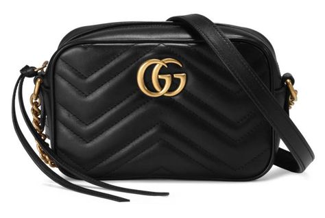 Shop the GG Marmont matelassé mini bag by Gucci. The mini GG Marmont chain shoulder bag has a softly structured shape and a zip top closure with Double G hardware. The chain shoulder strap has a leather shoulder detail. Made in matelassé leather with a chevron design and GG on the back. Gucci Purse Outfit, Gg Marmont Matelassé Mini Bag, Gucci Marmont Mini, Gucci Gg Marmont Matelasse, Gucci Gifts, Gucci Purse, Gucci Purses, Roshe Run, Gucci Gg Marmont