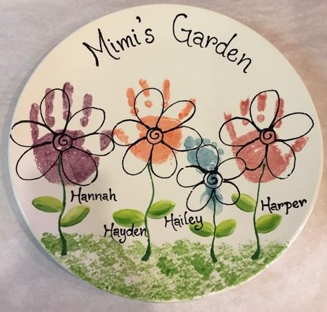 Pottery Gifts For Grandparents, Pottery For Mom Gift Ideas, How To Make Plates With Handprints, Grandparents Handprint Craft, Handprint Flower, Grandkid Handprint Art, Plate Art Ideas, Hand Print Plate Ideas, Ceramic Painting Plates