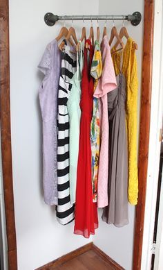 Hanging Dresses In Closet Small Spaces, Hanging Dresses In Closet, Clothing Storage Ideas, Hanging Dresses, Dress Storage, Corner Closet, Small Closet Space, No Closet Solutions, Closet Remodel