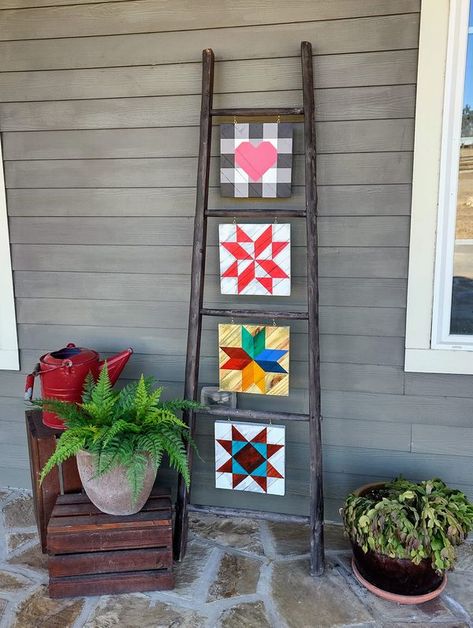 Barn Quilt Addicts | Mini Barn quilts and an old ladder...instant porch decor | Facebook Crafts Adults Diy Projects, Chicken Barn Quilt Patterns, Cardinal Quilts, Barn Quilts For Sale, Sewn Projects, Simple Quilts, Quilt Ladder, Mini Barn, Wood Snowflake