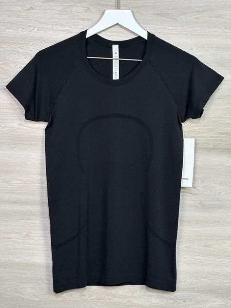 Lululemon Swiftly Tech Short Sleeve 2.0 Size 8 Black 50155 071823CR1 Condition is New With Tags. Shipped with USPS. Will combine shipping on multiple purchases and refund any shipping overage on orders shipped within the US (Combined shipping not available for separate Ebay International Shipping Orders please contact me for a bundle listing) . Black Lulu Swiftly Tech, Black Lulu Swiftly, Lululemon Swiftly Tech Short Sleeve Black, Lululemon Black Swiftly Tech, Black Lululemon Shirt, Black Swiftly Tech Outfit, Lululemon T Shirt, Lululemon Shirts & Tops, Lulu Wishlist