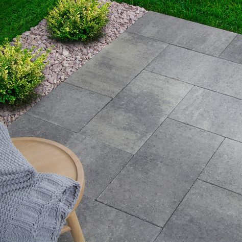 Oldcastle 24-in L x 12-in W x 2-in H Rectangle Rio Blend Concrete Patio Stone Lowes.com Patio With Concrete Squares, Crushed Concrete Patio, Rectangle Paver Patio, Back Patio Flooring Ideas, Cement Pavers Patio, Black Concrete Patio, Dark Grey Deck, Slate Patio Ideas, Backyard Patio Flooring