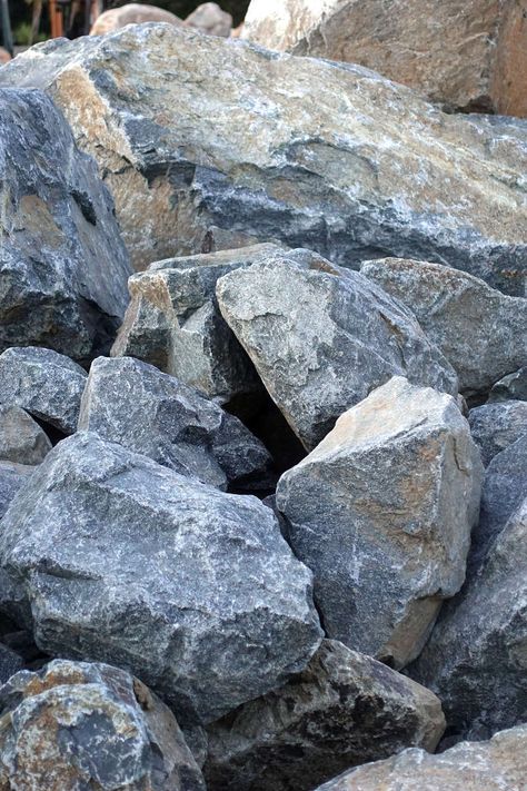 Stormy charcoals battle with the serene and venerable ashen tones. The gray color fusion of this boulder is bold intrepid and powerful.  | Southwest Boulder & Stone