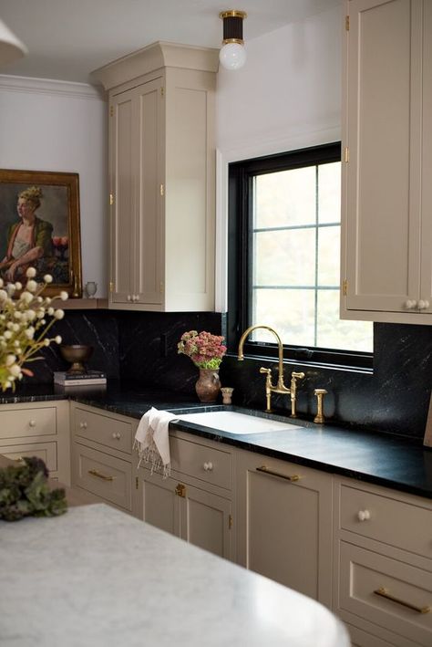 15 Beautiful Kitchens with Soapstone Countertops - Nikki's Plate Dark Counter Backsplash Ideas, Dark Counter White Cabinets, English Style Kitchen Ideas, Dark Counter Kitchen Ideas, Black Kitchen Countertops Beige Cabinets, Tan Kitchen Black Counter, Amber Interior Kitchen, Beige Cabinet Black Countertop, Black Countertops Kitchen Decor