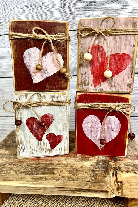 Elevate your rustic home decor game with our unique reclaimed wood primitive valentine blocks. Perfect as mantel decorations or tiered tray additions, these handcrafted masterpieces make for the ideal Valentine's Day gift. Click through to see how these beautiful blocks can transform your home! Wood Crafts For Valentines Day, Rustic Valentine Crafts, Valentines Day Wood Crafts, Primitive Valentine Crafts, Valentine Blocks, Primitive Crafts Diy, Valentine Craft Decorations, Valentine Wood Crafts, Primitive Valentine