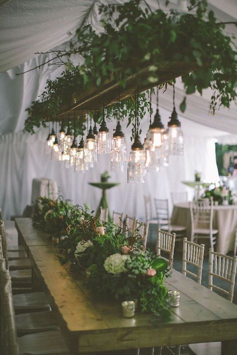 Bring the outdoors inside with lots of foliage and flowers. Hanging Centerpiece, Flowers And Greenery, Wedding Tent, Long Table, Deco Floral, Woodland Wedding, The Ceiling, Forest Wedding, Greenery Wedding