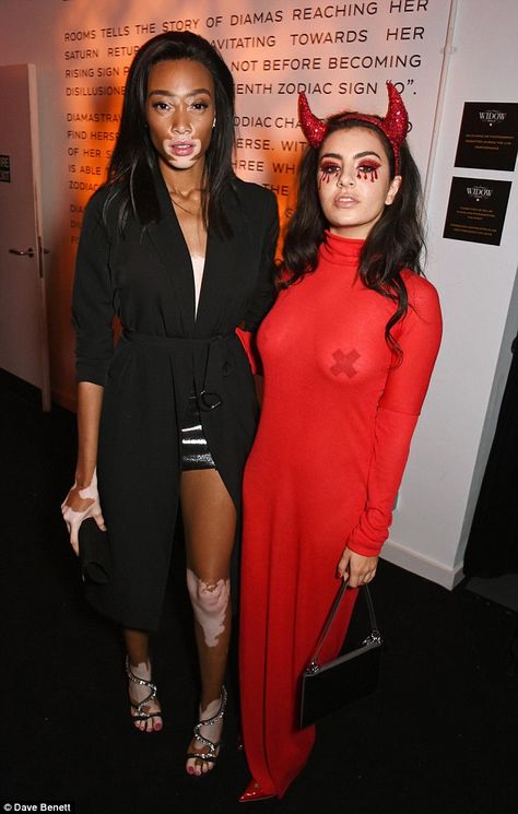 Devilishly good! Charlie XCX dared to bare all as she slipped into a sexy devil costume for the Veuve Clicquot Widow Series Halloween party with Winnie Harlow in London on Wednesday Diy Devil Costume Women, Devil Outfit Halloween, Devil Halloween Costume For Women, She Devil Costume, Cute Devil Costume, Hot Devil Costume, Devil Costume Women, Veuve Clicquot Party, Halloween Performance