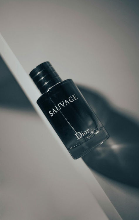 Experience the irresistible allure of Dior Sauvage. This iconic fragrance blends fresh bergamot, spicy Sichuan pepper, and deep amber wood to create a bold and captivating scent. Perfect for any occasion, Dior Sauvage exudes confidence and sophistication. Feel empowered and unforgettable. Keywords: Dior Sauvage, iconic fragrance, captivating scent, confidence, sophistication, long-lasting, high-quality, timeless elegance. Dior Savage, Mens Perfume, Perfume Logo, Best Perfume For Men, Blue Stuff, Dior Sauvage, Sichuan Pepper, Dior Perfume, Men's Fragrance