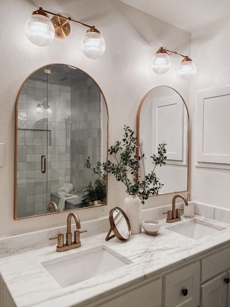 Bathroom with gold accents