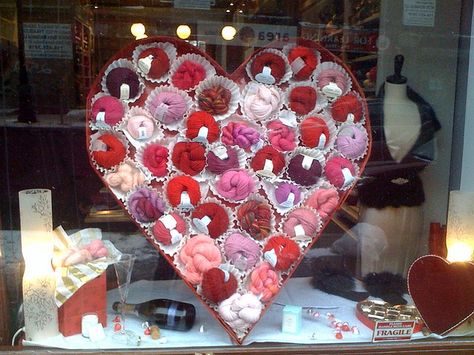 yarn shop window displays | photo Valentines Window Display, Yarn Display, Valentine Paper Crafts, Window Display Retail, Decoration Vitrine, Heart Shaped Candy, Store Window Displays, Window Display Design, Store Window