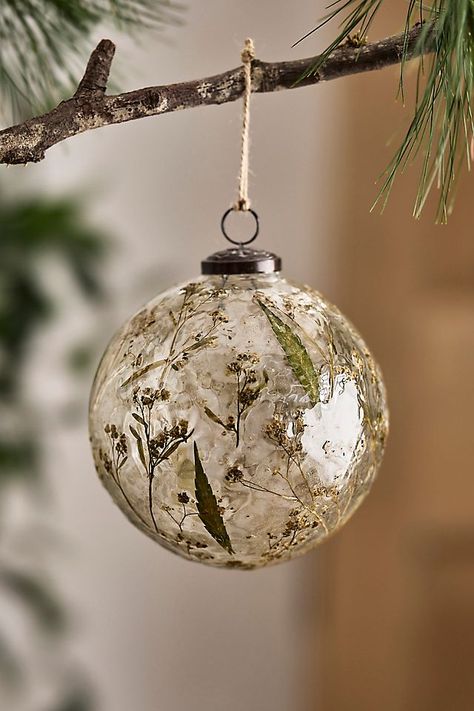 Pressed Botanicals Glass Globe Ornament Glass Blown Ornaments Christmas Tree, Christmas Tree Clear Ornaments, Handmade Glass Ornaments, Christmas Tree With Glass Ornaments, Moss Christmas Decorations, Dried Flower Ornament, Pressed Flower Ornaments, Earthy Christmas Decor, Anthropologie Christmas Decor