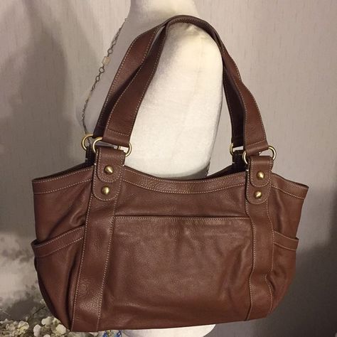 Shop kabogdan's closet or find the perfect look from millions of stylists. Fast shipping and buyer protection. Beautiful all leather bag in a warm chocolate brown. Great bag for organization. It has three exterior pockets that snap closed. Inside you’ll find a nice zipper pocket on one side. The facing side has 2 slip pockets, 5 credit card pockets and two pen pockets. Top has a magnetic closure. Handle drop about 10”. Dust cover included matches the bags interior in Barr & Barr signature ... Brown Tote Bags, School Handbag, Brown Leather Laptop Bag, Handbag Inspiration, Fall Bags, Brown Tote Bag, Handbag Essentials, Brown Leather Crossbody Bag, Warm Chocolate