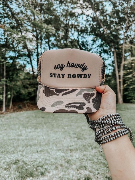 Best Seller! Say Howdy, Stay Rowdy Trucker Hat, Party hat, Bachelorette Hat, Birthday Gift Hat, Single Ladies Gift, Inappropriate Hat, Funny Gifts Make any night out or any errand-run a party with this fun Say Howdy, Stay Rowdy Hat! Crafted from 100% nylon mesh, it's perfect for bachelorettes, girls night out, or just a little sassy flair any time you're out and about. Get ready to let the good times roll! (And drink responsibly!)                           Nashville Style Trucker Hat | Bachelore Cowgirl Trucker Hat, Trucker Hat Designs, Bachelorette Hats, Funny Trucker Hat, Drink Responsibly, Custom Trucker Hats, River Trip, Hat Party, Nashville Style