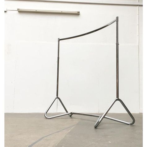 Rare mid century tubular steel coat rack by bremshey & co, solingen.  a timeless and functional design made of tubular steel. The whole stand is a slight arc. The lower rack consists of several elements, but looks like one continuous tube. The tube forms elegant loops towards the bottom. The actual clothes rail can be adjusted in height in 10 cm increments and fixed with a cotter pin. the wardrobe is in very good condition with traces of use.  dimensions: h: 124-164 cm, w: 150 cm, d: approx. 75. Mid Century Clothes Rack, Steel Tube Ideas, Space Age Interior, Metal Clothing Rack, Retail Clothing Racks, Clothing Rail, Creative Studio Space, Metal Coat Rack, Corner Rack