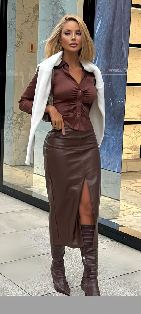 Fall Leather Mini Skirt, Leather Skirt Brown Outfit, Leather Skirt And Corset Outfit, Brown Boots And Skirt Outfit, High Fashion Winter Outfits, Fendi Belt Outfit, Beige Skirt Outfit Fall, Leather Bra Outfit, Leather Brown Skirt Outfit