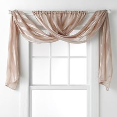 This would be an easy one to DIY—just make two long panels of fabric you like, hang them on the rod, criss-cross them, and drape them over the ends of the rod! Draping Idea, Curtain Placement, Curtain Draping, Kitchen Window Dressing, Simple Window Treatments, Bathroom Window Curtains, Hang Curtains, Curtain Hanging, Draping Fabric