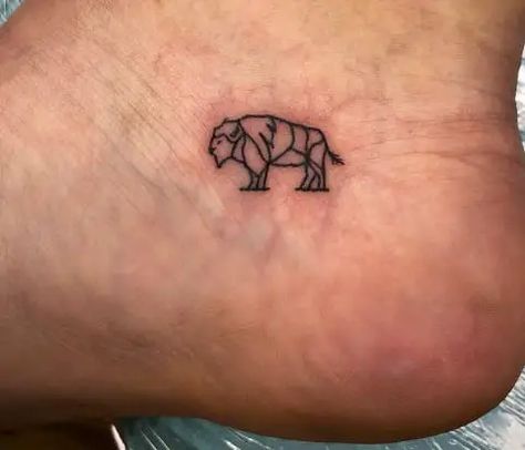 50 Beautiful Bison Tattoo Designs With Meanings For Animal Lovers - Tattoo Twist Small Buffalo Tattoo Simple, Minimalist Bison Tattoo, Buffalo Line Tattoo, Tiny Buffalo Tattoo, Buffalo Face Tattoo, Small Buffalo Tattoo, Buffalo Drawing Simple, Bison Tattoo Ideas For Women, Yellowstone Tattoo Ideas