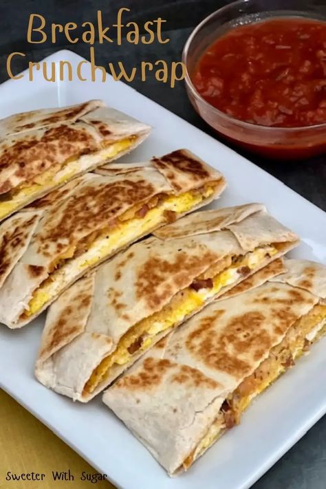 Breakfast Crunchwrap is a twist on Taco Bell's Crunchwrap Supreme. This is full of egg, bacon, two kinds of cheese and salsa. Breakfast Crunchwraps are a delicious breakfast idea. #Crunchwrap #Breakfast #EasyBreakfastRecipes #TacoBell #Rico'sNachoCheeseSauce #BreakfastCrunchwrap Crunchwrap Breakfast, Breakfast Crunchwrap Recipe, Salsa Breakfast, Super Moist Cornbread, Breakfast Crunchwrap, Crunchwrap Recipe, Barbecue Chicken Pizza, Grilled Chicken Caesar Salad, Crunchwrap Supreme