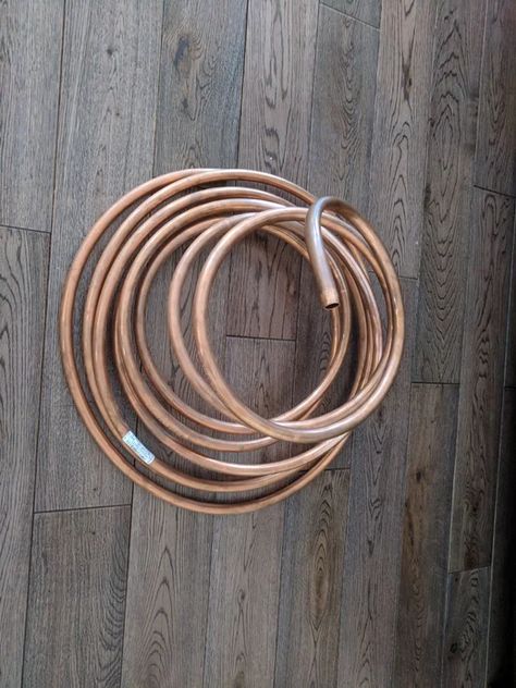 This instructables will serve as a general guideline on how to build you own spiraling tree. I do not have any measurements on hand as everything was pretty much improvised. Add TipAsk QuestionCommentDownload Step 1: Materials 2 More Images 1 x 25 foot 1/2 inch copper tubing/copper refrigeration coil. This is the main spiral of the tree https://www.renodepot.com/en/copper-pipe-0144048 1 or 2 x 6 feet 1/2 straight copper tube. This will serve as internal support for the tree ht Copper Tubing Projects, Copper Pipe Projects, Spiral Tree, Copper Tube, Copper Diy, Spiral Shape, Copper Pipe, Copper Tubing, Tree Shapes