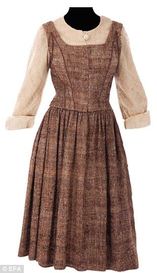 This is the brown dress worn by Maria as she sang 'Do-Re-Mi' to the Von Trapp children Sound Of Music Party, Sound Of Music Musical, Sound Of Music Costumes, Music Costume, Iconic Costumes, Sound Of Music Movie, Music Dress, The Hills Are Alive, Broadway Costumes