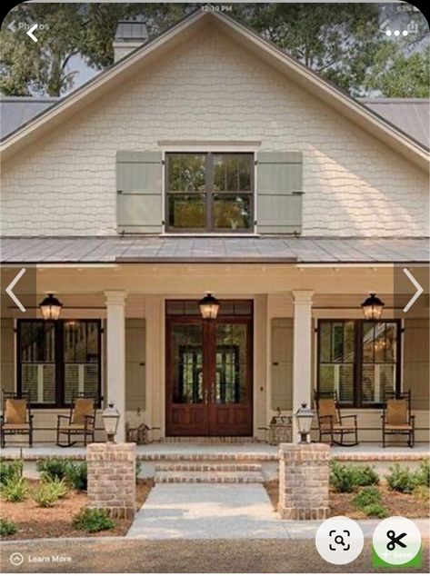 Yellow Cream Siding House Color Schemes, Sage Shutters Tan House, Tan Siding With Green Shutters, Limewash Brick Foundation, Tan And Green Exterior House, White House With Cedar Posts, Sage Farmhouse Exterior, Tan House Gray Shutters, Sage Green Front Door Tan House