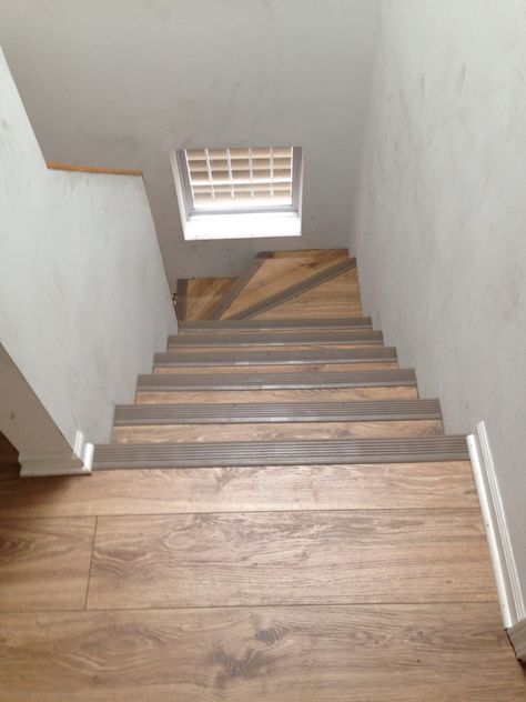 Laminate we installed on the stairs with rubber stair nosing 773-447-7161 Laminate Flooring On Stairs, Stairs Edge, Vinyl Stair Nosing, Laminate Stairs, Laminate Flooring Colors, Stair Makeover, Stairs Makeover, Flooring For Stairs, Foyer Decor