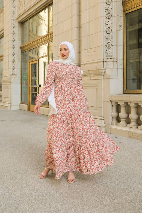 Spectacular, utterly fashionable, and insanely comfortable are perfect ways to describe Niswa’s new Haya Floral Maxi Gown. This stunning printed floral dress hints at spring. The floor-length dress features smocked bodice detailing, a gorgeous twirl-worthy skirt, cinched balloon sleeves, and a high rounded neckline. - Care: Dry Clean Recommended. Hand Wash/Hang Dry. - Composition: Polyester Blend - Lined - Not Transparent - Fit: Standard FitModel wearing size S Dress Measurements: SIZE BUST WAIS Muslim Maxi Dress, Floral Maxi Dress Outfit Summer, Casual Hijab Dress, Maxi Dress With Hijab, Dress Floral Hijab, Maxi Dress Hijab, Maxi Dress Hijab Outfits, Floral Dress Modest, Full Sleeve Maxi Dress