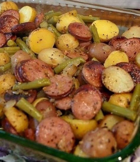 This dish is perfect for those crazy busy weeknight dinners. With just a few minutes prep time, you can have an awesome dinner that your whole family will enjoy! The sausage and green bean potato bake taste amazing together in one pan – like something straight outta restaurant quality cooking school (and way better than […] Sausage Potatoes Green Beans, Sausage Green Bean Potato Casserole, Green Bean Potato Casserole, Smoked Sausage And Potato Recipe, Sausage And Green Beans, Sausage And Potato Bake, Sausage Potato Casserole, Sausage Casserole Recipes, Potatoes Green Beans