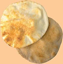 Lebanese Pita Bread | Recipes Wiki | Fandom Lebanese Pita Bread Recipe, Lebanese Flat Bread, Syrian Bread, Arabic Bread, Naan Flatbread, Homemade Pita Bread, Pita Bread Recipe, Pitta Bread, Flatbread Recipes