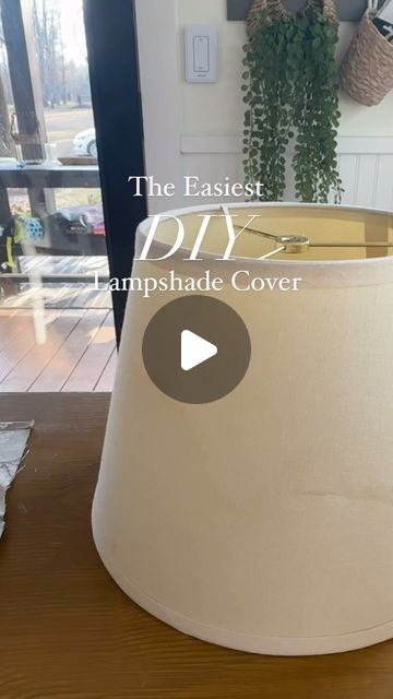 Lia Watson~Southern Yankee DIY on Instagram: "Lampshades aren’t cheap…  With this easy DIY lampshade hack you can update cracked, boring, or out of style lampshades with just a little fabric!   The best part is you don’t have to sew anything & you can knock on this DIY out in less than an hour.  ✨Want more no sew diy fabric home decor projects? Find them all at SouthernYankeeDIY.com & FOLLOW @southernyankeediy to never miss a budget friendly home project!   Do you have a tablecloth that would also make a great lampshade?" Sew Lampshade Cover, Fabric Over Lamp Shade, Basket Into Lampshade, Lamp Makeover Shade, Trending Lamp Shades, Recover A Lampshade With Fabric, How To Redo A Lamp Shade Diy, Cloth Lampshade Diy, Lamp Shade Design Ideas