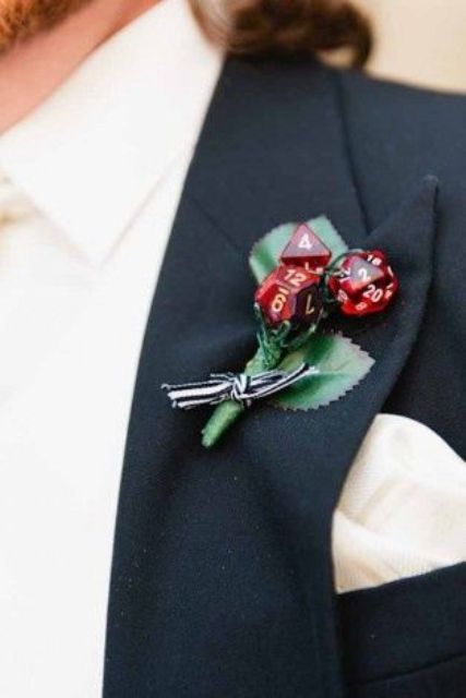 a creative wedding boutonniere of silk leaves, red dices and a striped bow is a fun idea for a groom who loves to play Red Boutonniere, Gamer Wedding, Nerd Wedding, Geeky Wedding, Halloween Fest, Geek Wedding, Fantasy Wedding, Future Wedding Plans, Halloween Wedding