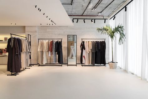 The Kape Showroom | SUPERFUTUREDESIGN* A Clothing Store, Retail Store Interior Design, Clothing Store Interior, Clothing Store Design, Store Design Boutique, Retail Store Interior, Clothes Hanging, Store Layout, Boutique Interior Design