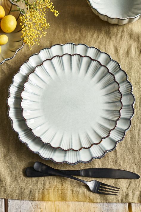 Anchor an elegant tablescape with this collection of stoneware dishes, each one finished with a gracefully scalloped rim. Dinnerware Table Setting Ideas, Beach Plates Dishes, Anthropologie Kitchen Dishes, Scalloped Ceramic Plate, Mix Match Plates Place Settings, Art Deco Dishes, Cool Plates Dishes, Fancy Plates Table Settings, Anthropologie Tablescape