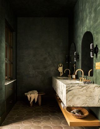 https://www.livingetc.com/ideas/colors-that-go-with-white-marble Floating Marble Vanity, Urbanology Designs, Moody Interior Design, Moody Home Decor, Timeless Interior Design, Moody Vintage, Dark Green Walls, Dark Bathrooms, Custom Millwork