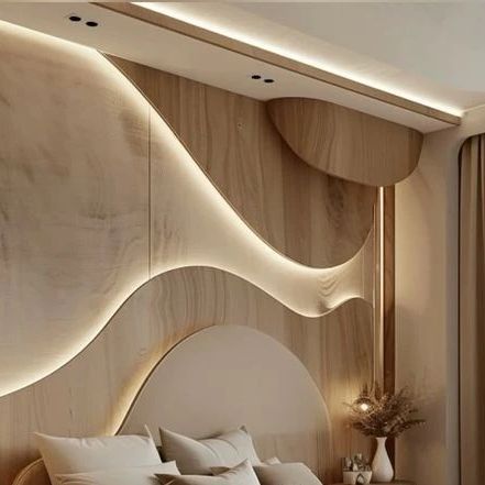 NS Interiors | Delhi on Instagram: "Parametric style bedroom!  • Curvy lines on bed wall woth cove light • Wooden touch with minimal tones  Follow- @_ns_interiors for amazing designs and concepts   Pc- @pinterestindia   #interior #interiors #interiordesign #interiordesigner #interiordesignerslife #interiordecor #decor #design #designerofinstagram #homedecor #home #styling #homestyling #furniture #furnituredesigner #furnituredesign #designer #interiordesignideas #interiorstyling #designers #igdesign #designforinstagram #igers #instagood #interiorarchitecture #workinprogress #sitework #interiorstyling #interiorart #ns_interiors" Parametric Bedroom Design, Squiggle Light On Wall, Wavy Headboard, Cove Light, Parametric Wall, Curved Bed, Cove Lighting, Bed Design Modern, Architectural Section