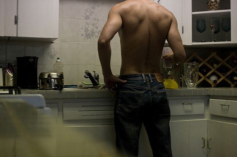 hmm sexy back andd he's cooking ;) The Kitchen