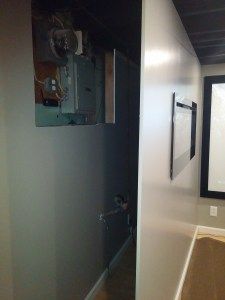 How to build a hinged wall with casters to hide ugly utilities in your basement. Hiding Pipes, Utility Room Makeover, Basement Mudroom, Bookcase Doors, Hide Pipes, Hidden Bookcase, Small Home Renovation, Ideas For Basement, Hiding Ugly