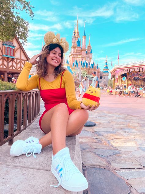 Wearing a winnie the pooh outfit at Walt Disney World behind Cinderella Castle Disney Outfits Magic Kingdom, Disneybound Outfits Couples, Pooh Disney Outfit, Disney Princess Outfits Women, Disney Magic Kingdom Outfit, Winnie The Pooh Inspired Outfits, Winnie The Pooh Outfit, Winnie The Pooh Disney Outfits, Disney Fits Spring