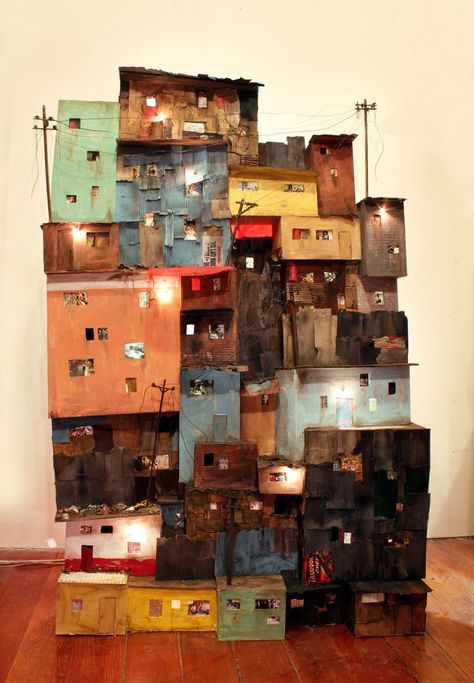 Oakland based artist Tracey Snelling, featured in Hi-Fructose Vol. 35, creates detailed dioramas and installations of urban landscapes. Ranging from miniature to large scale pieces, her installatio… Sculptural Installation, Cardboard City, Landscape And Urbanism Architecture, Cardboard Sculpture, Cardboard House, Landscape And Urbanism, Cardboard Art, Miniature Houses, Sculpture Installation